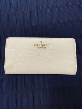 kate spade Cream Saffiano Zip-Around Wallet with Gold Logo